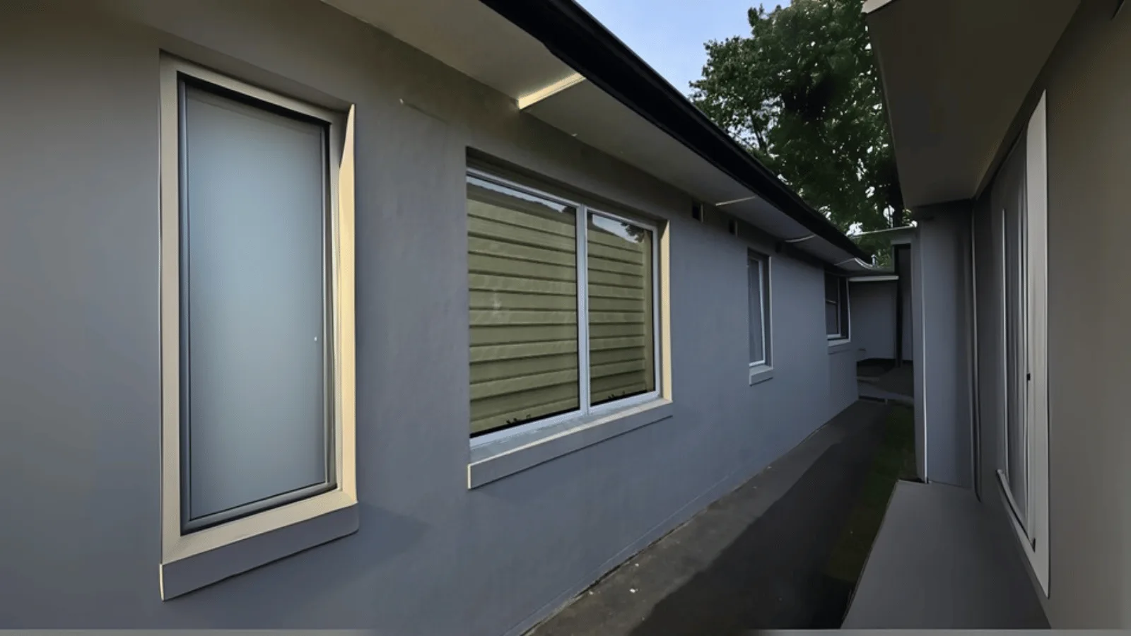 Untinted window with harsh sunlight and glare entering the room